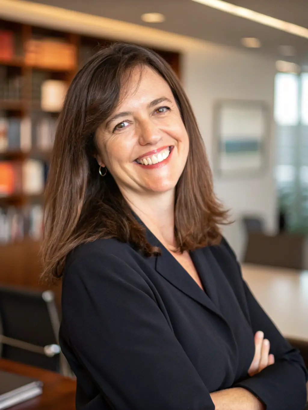 A professional headshot of a distinguished female speaker, Dr. Emily Carter, smiling confidently. She is a leading expert in sustainable food packaging and will be presenting at the upcoming FoodTech Innovation Conference.